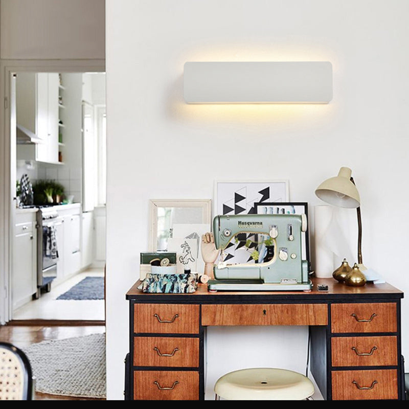 ANGULAR ROTATING WALL LAMP
