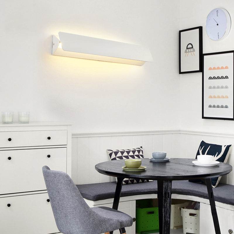 ANGULAR ROTATING WALL LAMP