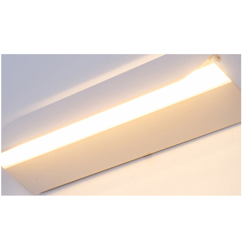 ANGULAR ROTATING WALL LAMP