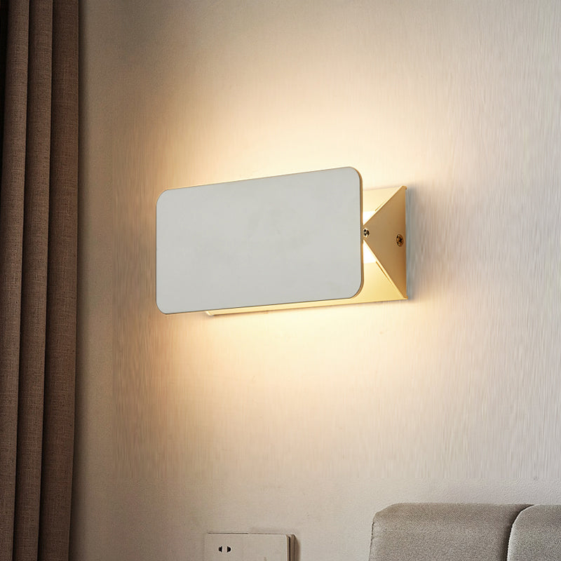 ANGULAR ROTATING WALL LAMP
