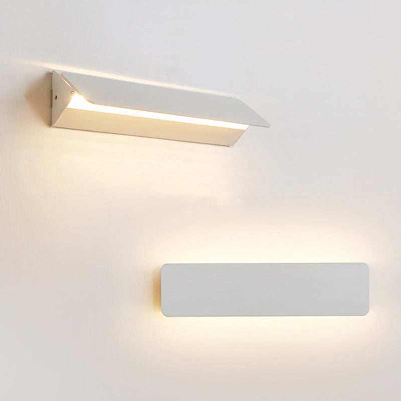 ANGULAR ROTATING WALL LAMP