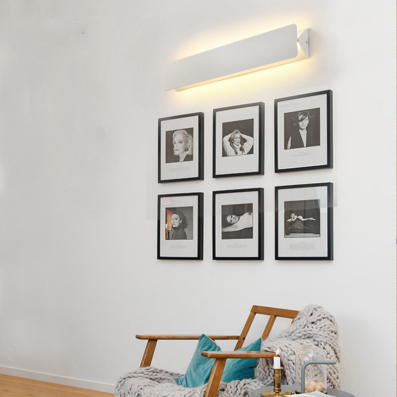 ANGULAR ROTATING WALL LAMP